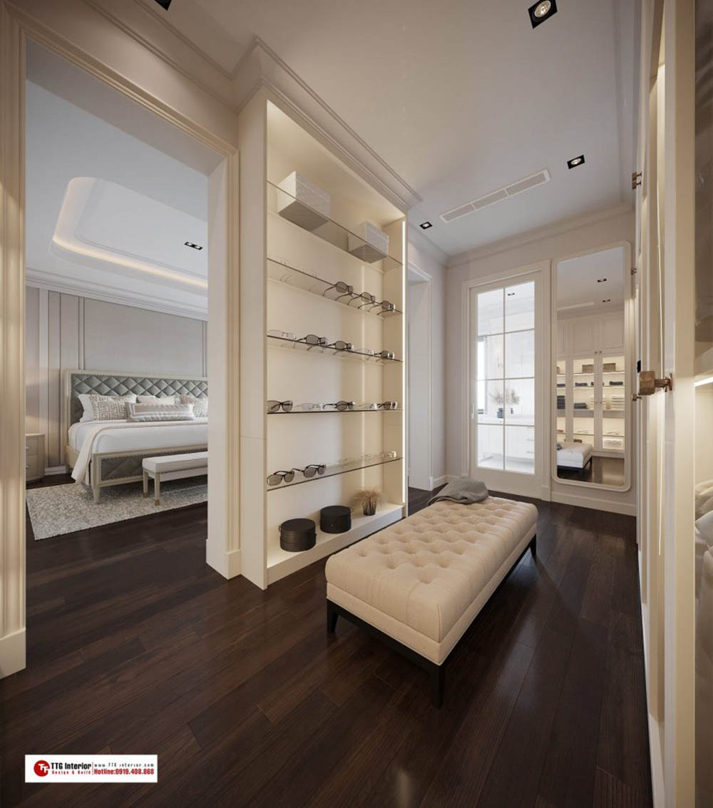 Thiết kế nội thất biệt thự nghỉ dưỡng với không gian thay đồ được bố trí nối liền với phòng ngủ tiện lợi 
